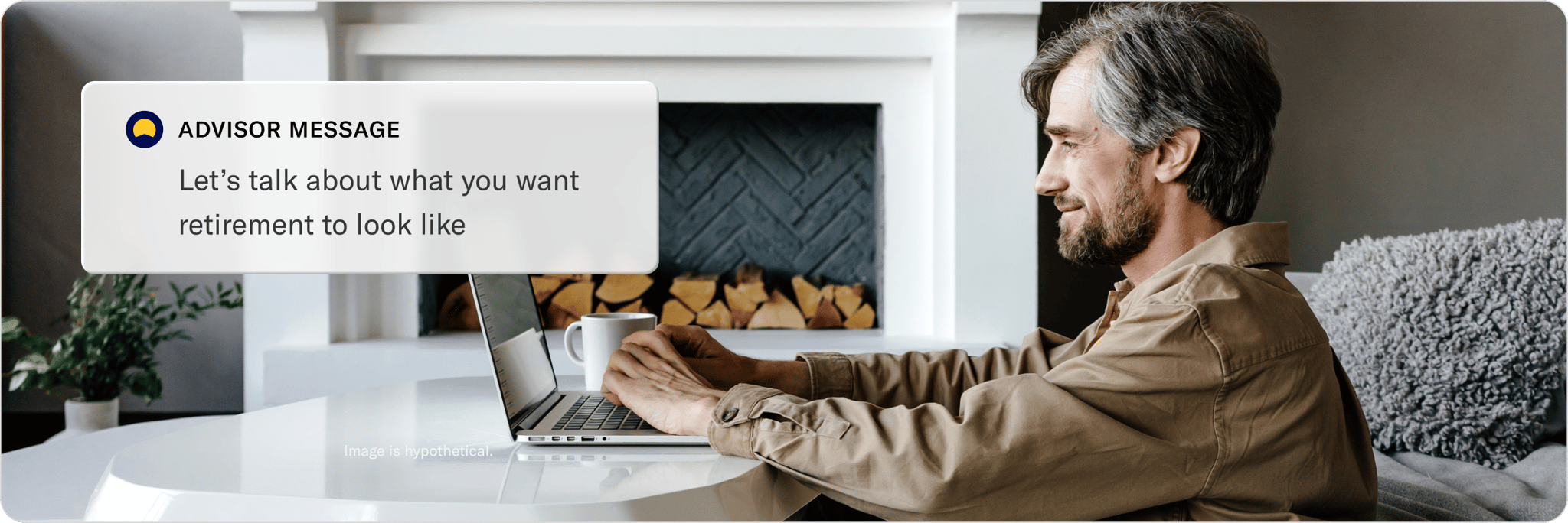 Man on a sofa smiling while using his phone